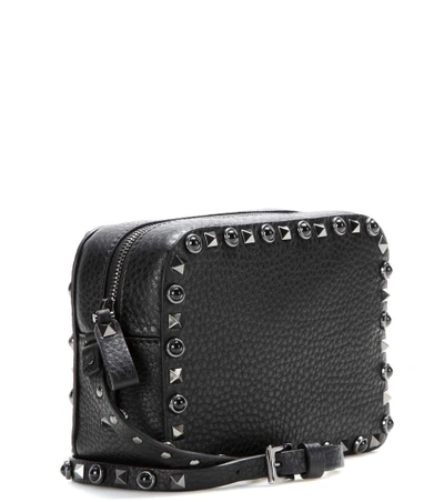 Shop Valentino Garavani Rockstud Rolling Noir Leather Cross-body Bag In Black