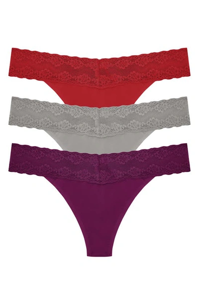 Shop Natori Bliss 3-pack Perfection Lace Trim Thongs In Purple/ Grey/ Red