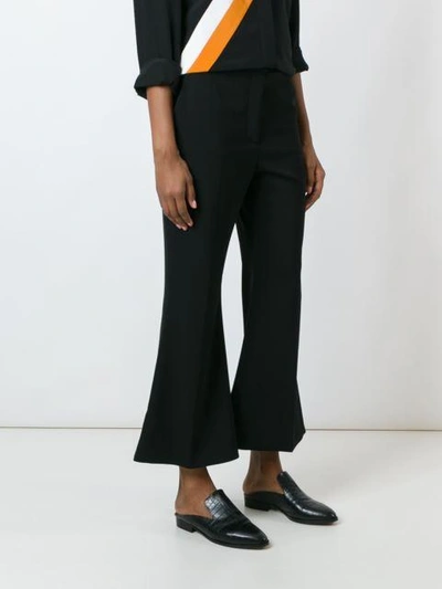 Shop Stella Mccartney Cropped Flared Trousers - Black