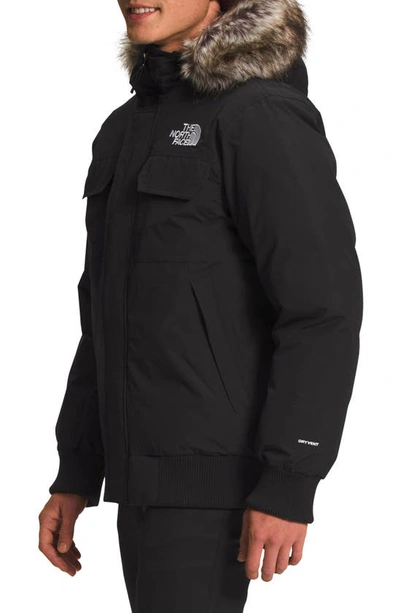 Shop The North Face Mcmurdo Water Repellent 600 Fill Power Down Parka With Faux Fur Trim In Tnf Black