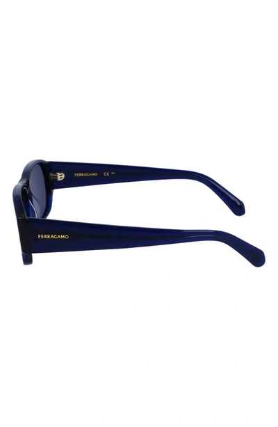 Shop Ferragamo 57mm Rectangular Sunglasses In Transparent Blue