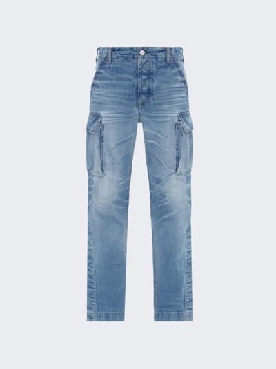 Shop Amiri M65 Cargo Kick Flare Jeans In Faded Indigo