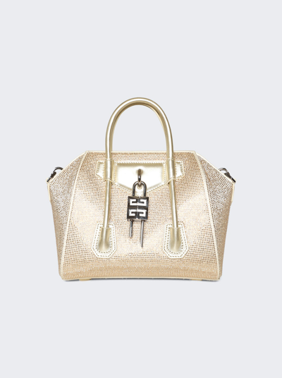 Shop Givenchy Mini Antigona Lock Bag In Blonde