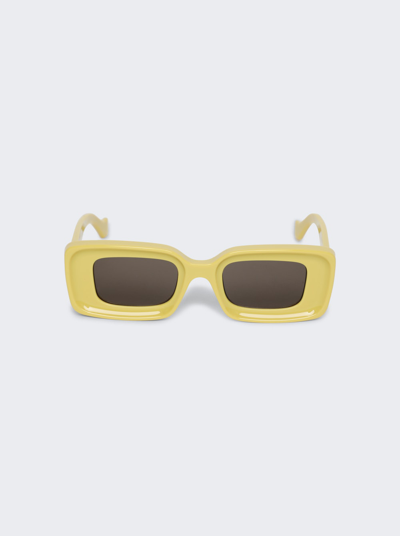 Shop Loewe Chunky Anagram Sunglasses In Shiny Yellow And Brown