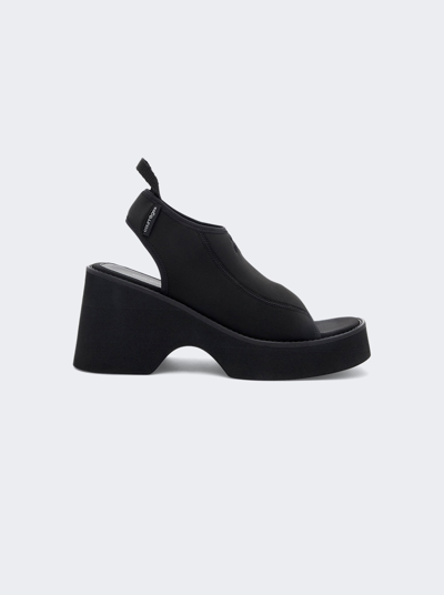 Shop Courrã¨ges Wave Sandals In Black