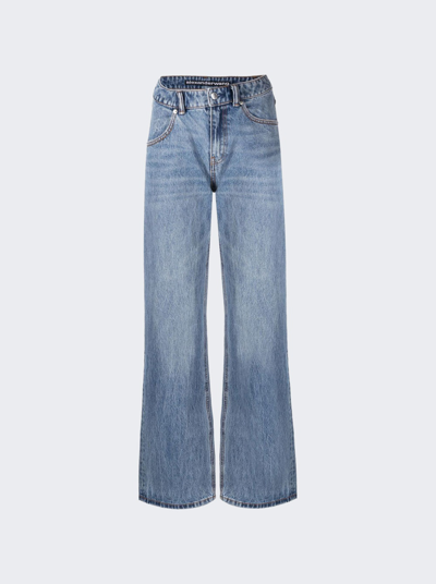 Shop Alexander Wang Asymmetrical Waistband Slouchy Jeans In Vintage Light Indigo Blue