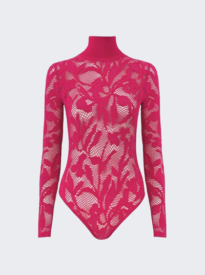 Shop Alaïa Lace Long Sleeve Bodysuit In Fuchsia