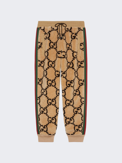 Shop Gucci Gg Jacquard Faux Fur Track Bottoms In Camel And Dark Brown