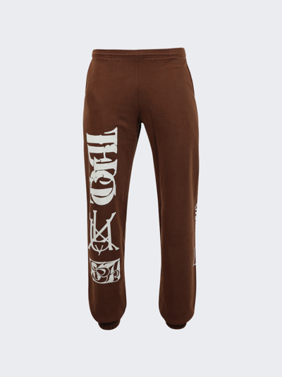 Shop Total Luxury Spa Monogram Sweatpants In Coffee Brown