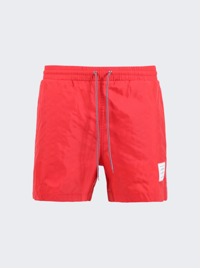 Shop Thom Browne Drawcord Waist Solid Swim Trunks In Red