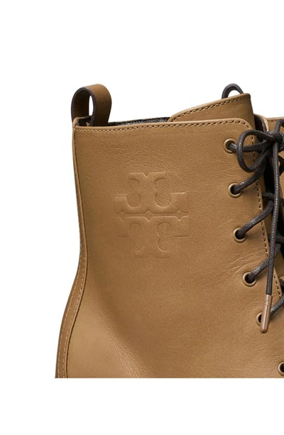 Shop Tory Burch Logo Embossed Lug Boot In Ginger Shortbread