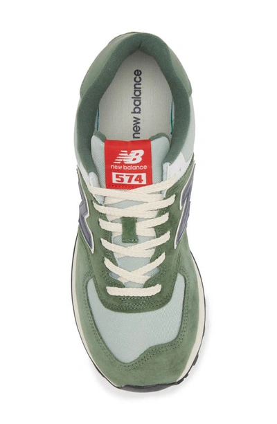 Shop New Balance Gender Inclusive 574 Sneaker In Acidic Green/ Navy