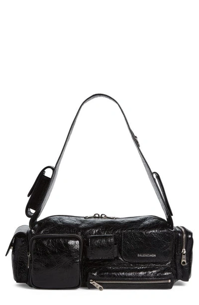 Shop Balenciaga Small Superbusy Crinkle Leather Sling Bag In Black