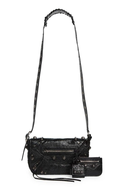 Shop Balenciaga Extra Small Le Cagole Leather Crossbody Bag In Black