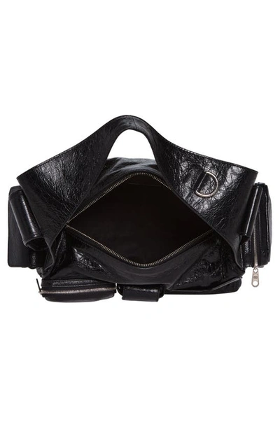 Shop Balenciaga Small Superbusy Crinkle Leather Sling Bag In Black