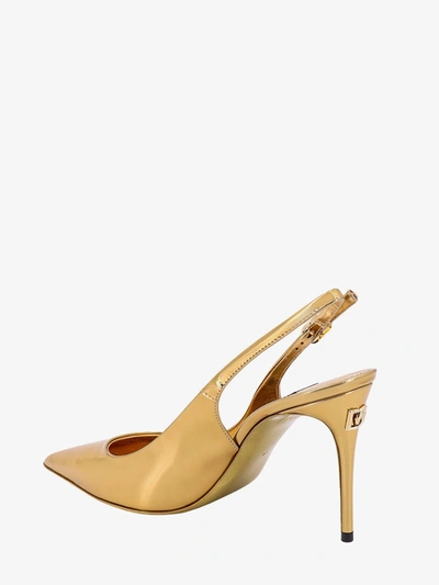 Shop Dolce & Gabbana Woman Slingback Woman Gold Pumps