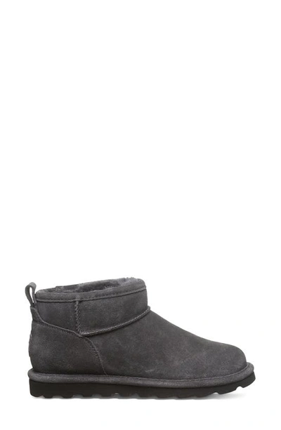 Bearpaw Shorty Genuine Shearling Lined Bootie In Graphite