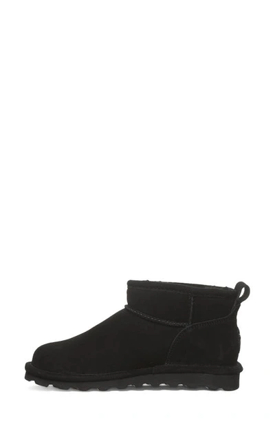 Bearpaw Shorty Genuine Shearling Lined Bootie In Black