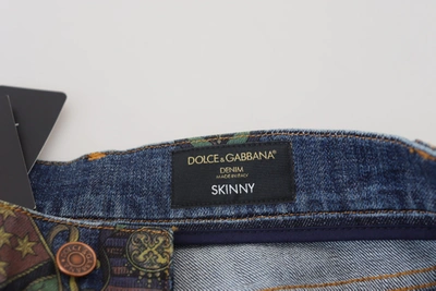 Shop Dolce & Gabbana Blue Heraldic Print Cotton Skinny Denim Men's Jeans