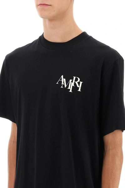 Shop Amiri Staggered Logo T-shirt In Black