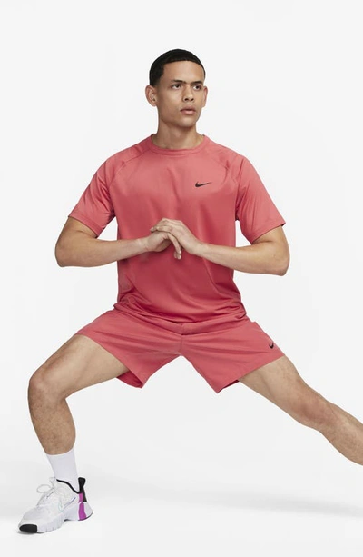 Shop Nike Dri-fit Form Athletic Shorts In Adobe/ Black