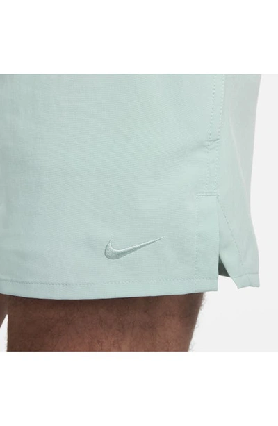 Shop Nike Dri-fit Unlimited 5-inch Athletic Shorts In Mineral/ Mineral/ Mineral