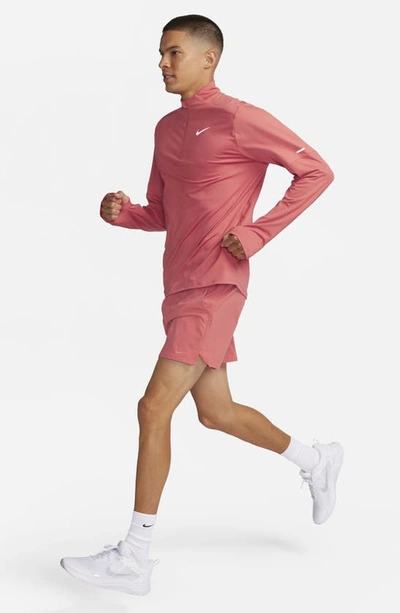 Shop Nike Dri-fit Unlimited 5-inch Athletic Shorts In Adobe/ Adobe/ Adobe