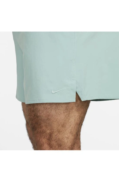Shop Nike Dri-fit Unlimited 5-inch Athletic Shorts In Mineral/ Mineral/ Mineral