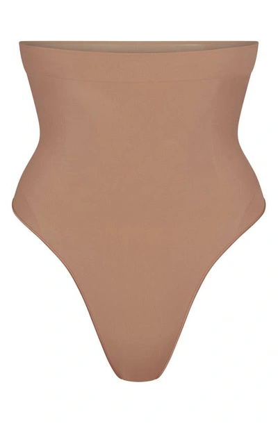 Shop Skims Seamless Sculpt High Waist Thong In Sienna