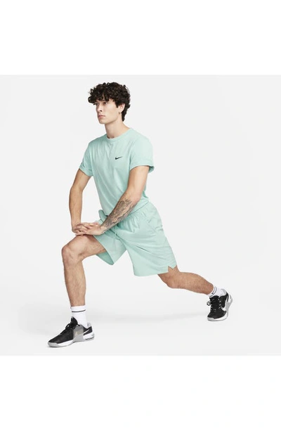 Shop Nike Dri-fit Unlimited Training Shorts In Mineral/ Mineral/ Mineral