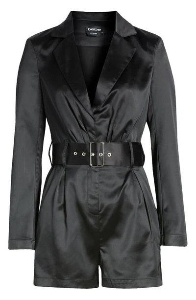 Shop Bebe Belted Long Sleeve Satin Blazer Romper In Black