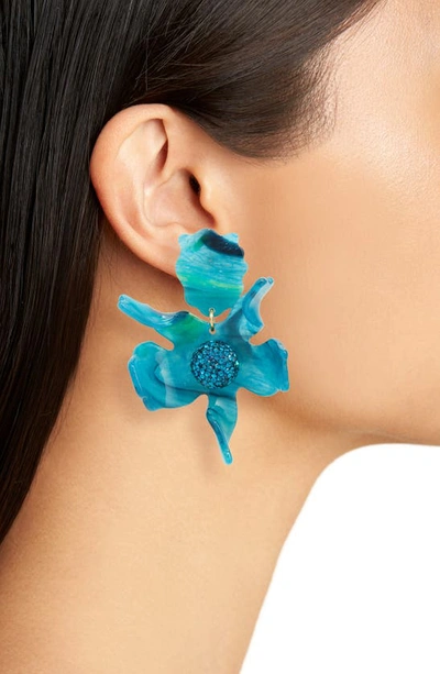 Shop Lele Sadoughi Crystal Lily Earrings In Deep Water