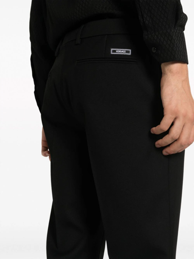 Shop Versace Pantaloni Formali In Black