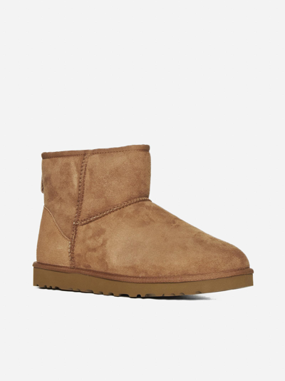 Shop Ugg Mini Classic Suede Ankle Boots In Marrone