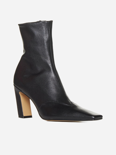 Shop Khaite Dallas Leather Ankle Boots In Black