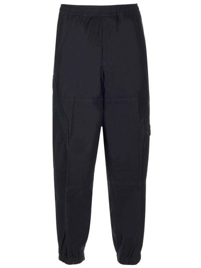 Shop Stone Island Ghost Tapered Leg Cargo Trousers In Blue