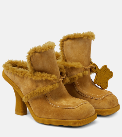 Shop Burberry Ekd Shearling-lined Suede Mules In Yellow