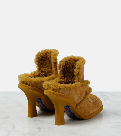 Shop Burberry Ekd Shearling-lined Suede Mules In Yellow