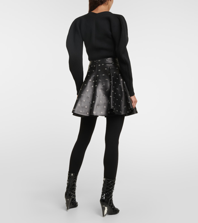 Shop Alaïa Eyelet Embellished Leather Miniskirt In Black