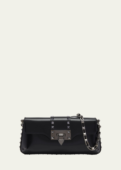 Shop Valentino Rockstud Small Leather Clutch Bag In Nero