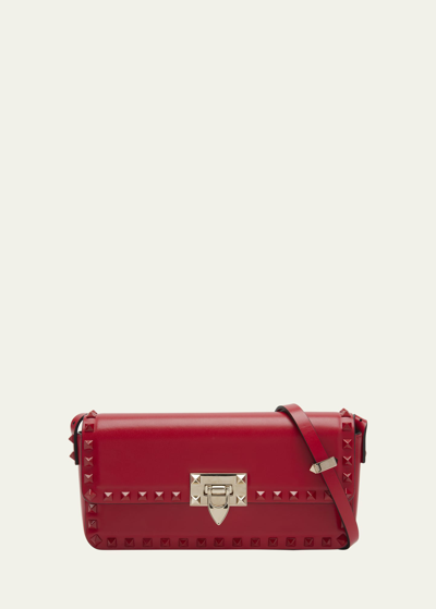 Shop Valentino Rockstud Flap Leather Shoulder Bag In Rouge Pur