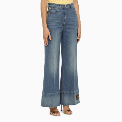 Shop Gucci Blue Flared Jeans With Patch Women
