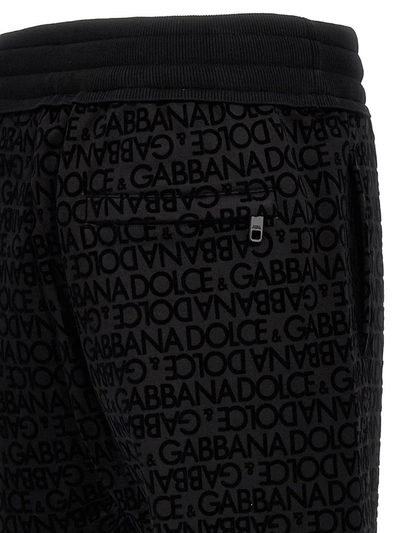 Shop Dolce & Gabbana Flocked Logo Joggers In Black