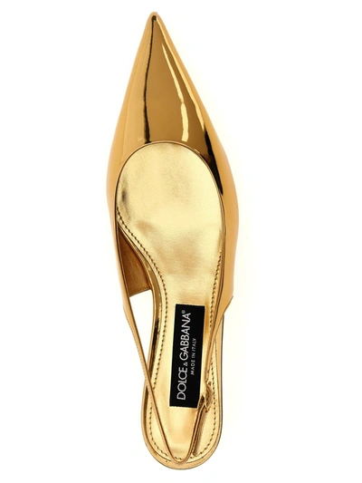 Shop Dolce & Gabbana Laminated Leather Slingback In Gold