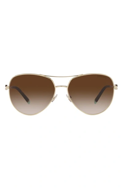 Shop Tiffany & Co 59mm Aviator Sunglasses In Pale Gold