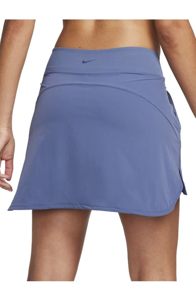 Shop Nike Dri-fit Bliss Training Skort In Diffused Blue/ Clear