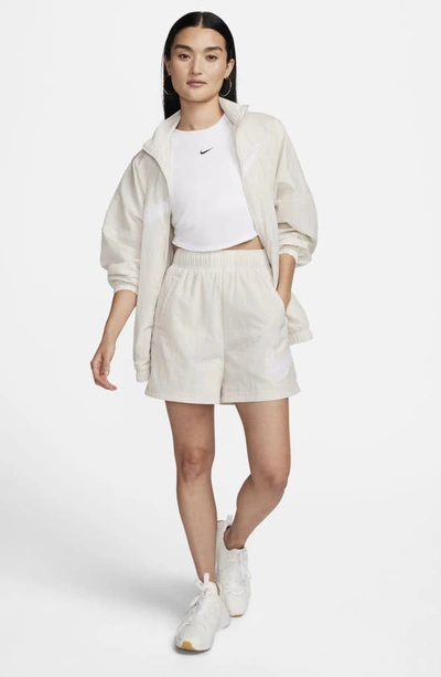 Shop Nike Sportswear Essential Woven Shorts In Light Orewood Brown/ White