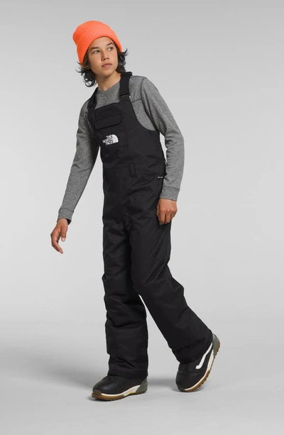 Shop The North Face Kids' Freedom Waterproof Insulated Recycled Polyester Snow Bib In Tnf Black
