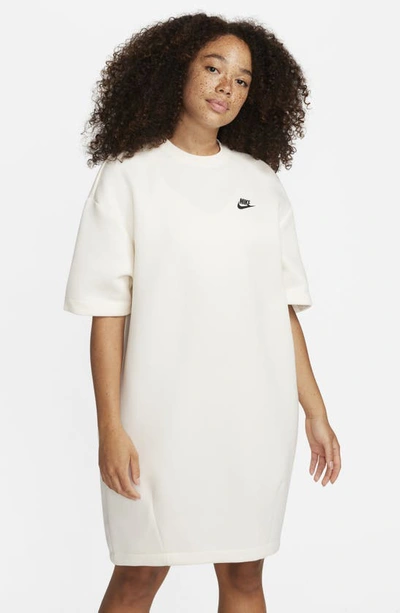Shop Nike Tech Fleece Oversize T-shirt Dress In Pale Ivory/ Black