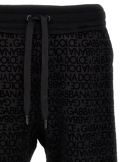 Shop Dolce & Gabbana Flocked Logo Joggers Pants Black